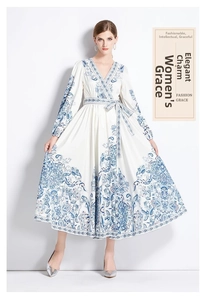 Detail of V-neck long sleeve floral maxi dress with blue ethnic prints and waist tie