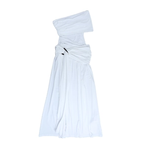 Detail of white one-shoulder maxi dress featuring ruched design and metal ring buckle