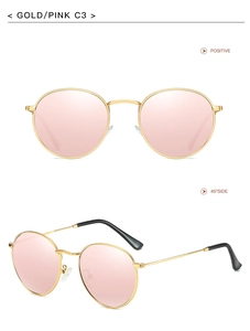 Classic round gold metal sunglasses with pink reflective lenses in front and side views