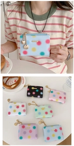Polished crosshatch leather mini wallets with metal heart charms in six pastel colors