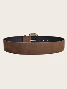 Close-up of wide brown suede belt featuring a polished gold buckle and textured leather
