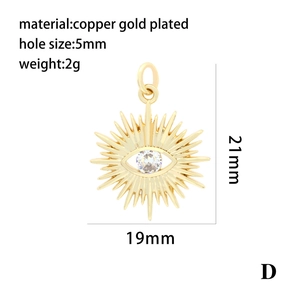 Detailed view of gold plated sunburst evil eye charm with dimensions 21mm by 19mm