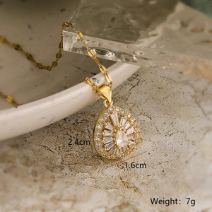 Luxury gold plated heart pendant necklace with shimmering zircon stones on marble background