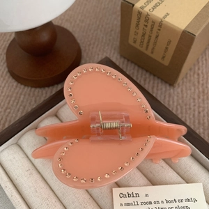 Pinza per capelli Y2K a cuore rosa pesca con strass e molla dorata in portagioie