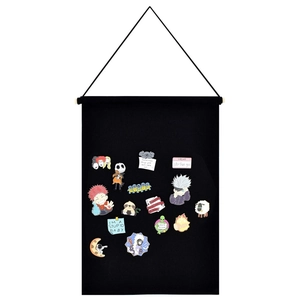 Detail of black canvas banner for displaying enamel pins and badges with wooden pole