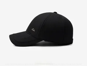 Detail view of winter baseball cap showing side profile and mountain logo badge