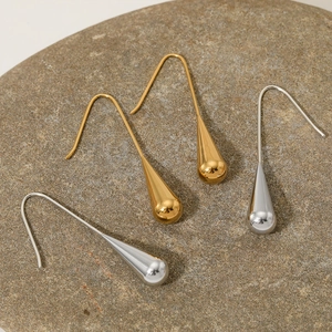 Minimalist stainless steel long teardrop earrings in polished gold and silver finishes