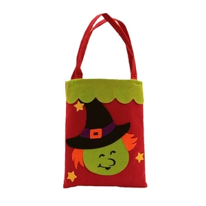 Red Halloween felt gift bag featuring a cartoon witch design and green scalloped edge