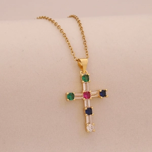 Luxury gold cross necklace for women featuring vibrant multi-colored gemstone accents