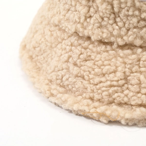 Winter faux lamb wool bucket hat for women in beige with soft plush fleece texture
