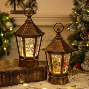 Vintage bronze Christmas lantern with Santa and snowman scenes for festive table decor