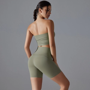 Detail view of avocado green seamless yoga set showing sleek high-waist fit and fabric texture