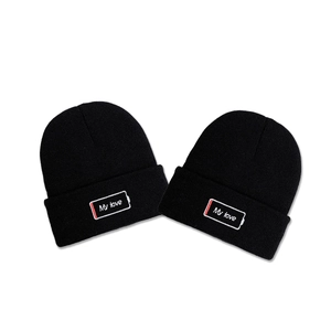 Set of two black knitted MY LOVE beanies with battery icon embroidery for winter