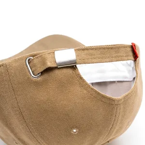 Khaki baseball cap with adjustable silver metal buckle and premium cotton twill texture