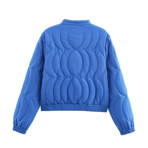 Back view of blue quilted jacket featuring vintage ethnic embroidery and ribbed cuffs