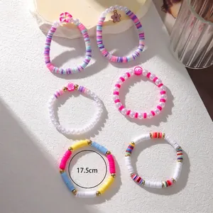 Boho colorful clay flower and pearl bracelet set for women featuring ocean shell charms