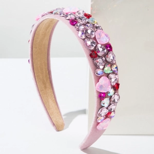 Pink velvet padded headband with colorful crystal hearts and rhinestone embellishments