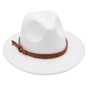Detail of white wool fedora hat featuring a brown suede band and decorative tassel