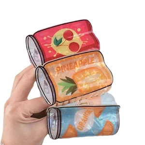 Three fruit juice can hair claws with cherry, pineapple and orange patterns