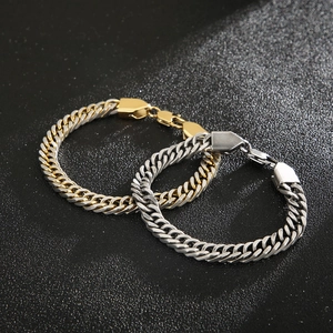 Polished gold and silver stainless steel Cuban link bracelets with lobster clasp on leather