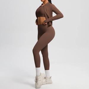 Three-piece chocolate brown yoga set featuring a sports bra, zip jacket, and high-waist leggings
