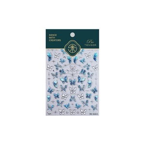 Stickers à ongles papillon bleu glacé et argent avec paillettes M-661 sous emballage