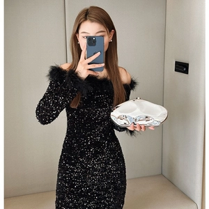Elegant black sequin off-shoulder mini dress with feather trim sleeves and slim fit design