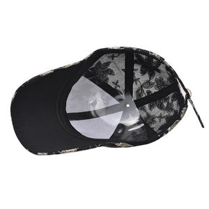 Close-up of the internal black lace embroidery and reinforced structure of the baseball cap