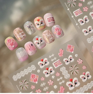 Detailed 3D embossed pink lion dance nail stickers with festive gold fireworks and patterns