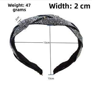 Detail view of braided rhinestone headband with dimensions 2cm width and 47g weight