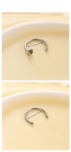 Detail view of 8mm inner diameter stainless steel C-shape horseshoe piercing with threading