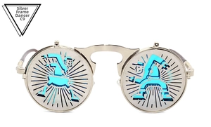 Detail of silver steampunk glasses with dancer cutout flip cover and blue mirror lens