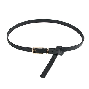 Women's thin black PU leather belt with elegant gold rectangular metal buckle on white background