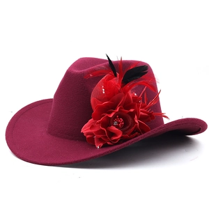 Deep red wool fedora hat with large fabric flower and black feather ethnic decor