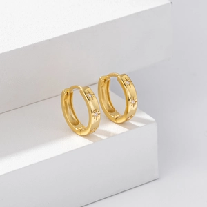 Elegant gold S925 sterling silver star earrings with white zircon on geometric background
