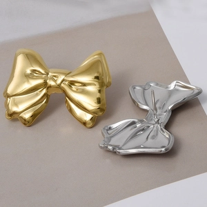 Polished 304 stainless steel bow knot stud earrings in gold and silver finishes