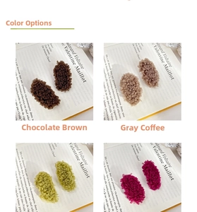 Detail of candy-colored faux lamb wool hair clips in brown, grey coffee, green, and red