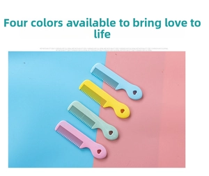 Close-up of four colorful baby hair combs with heart-shaped handles and rounded teeth