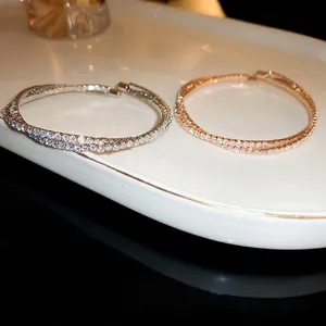 Elegant double-layered crisscross zircon open bracelet in silver and rose gold finish