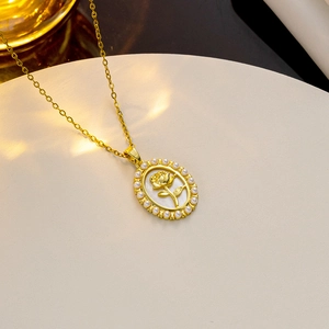 Elegant gold rose coin pendant necklace with shell inlay and pearls on a dainty chain