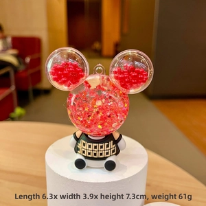 Detailed view of Mickey-shaped acrylic charm with starry sequins and size dimensions
