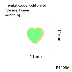 Detail view of 11mm green heart enamel bead in gold plated copper with size specifications