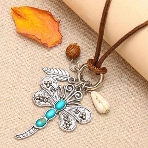 Vintage silver dragonfly necklace with turquoise pendant and beads on brown leather cord