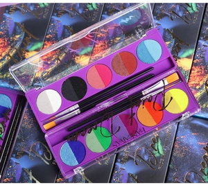 Detail of 12-color UV fluorescent face and body paint kit with application brushes