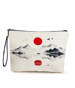Detailed view of landscape ink painting print on canvas makeup bag with zipper