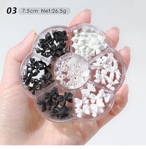 Detail of 7.5cm petal box with resin bows and pearls for nail art decoration