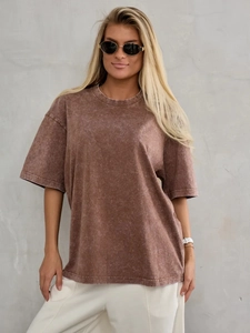 Close-up of vintage washed brown cotton t-shirt with heavy fabric texture and drop shoulder