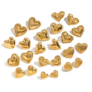 Elegant gold heart stud earrings with rhinestone accents and textured metal finish