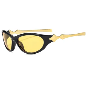Stylish Y2K cat-eye sunglasses with yellow lenses and geometric gold metal temples