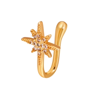 Golden non-piercing copper nose cuff featuring a sparkling starburst design with zircons
